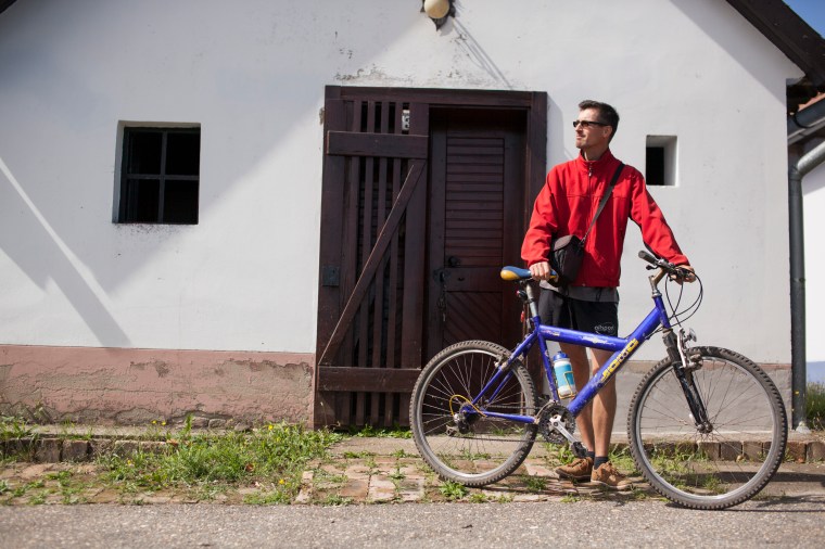 Milan in front of one the families wine cellars